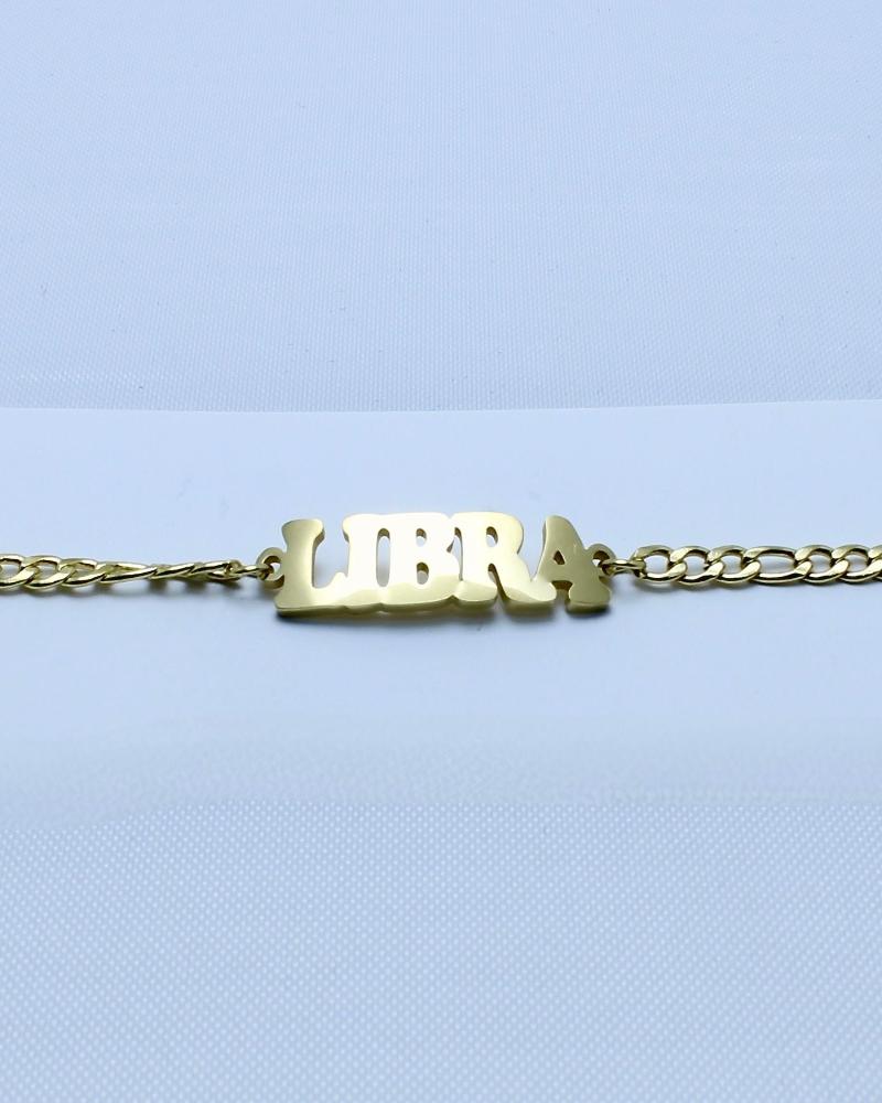 A series of stainless steel curb chains with gold plating, featuring various zodiac signs.