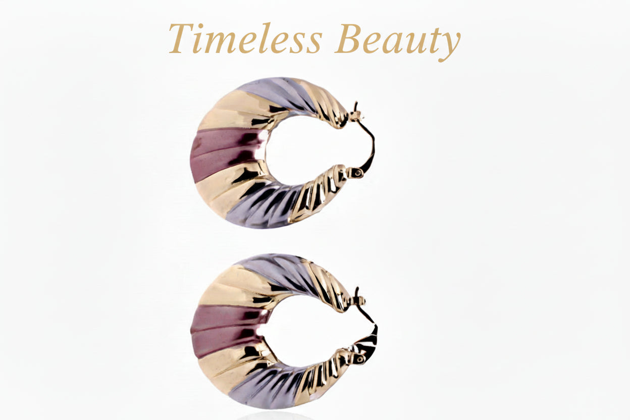 Pair of gold and purple brass zircon hoop earrings on a light purple background