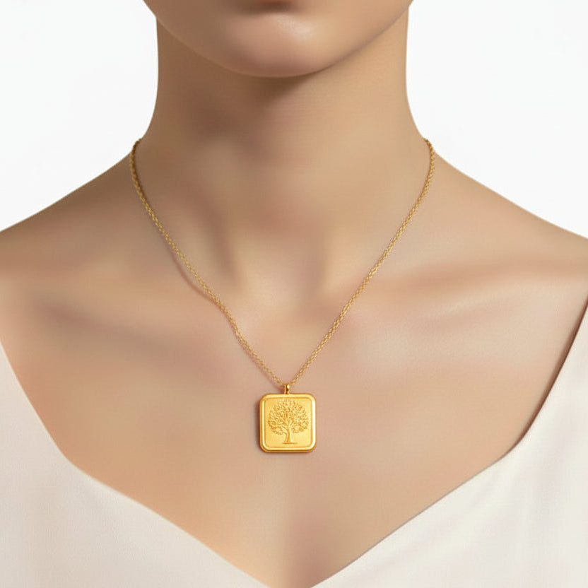 A gold-colored square flower pendant necklace displayed against a white background.